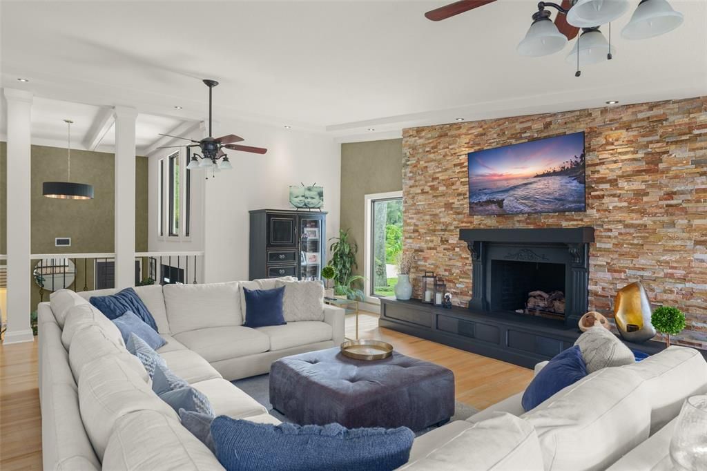 Fireplace, Interior, Living room, Pendant Lights, Recessed Lighting, Stone Walls, Wood Texture Flooring