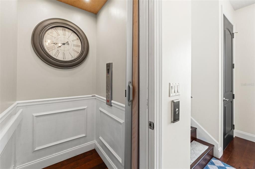 Elevator, Interior, Recessed Lighting, Wood Texture Flooring