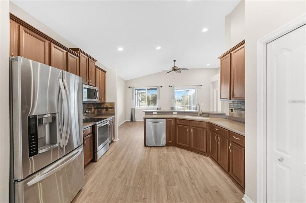 Interior, Kitchen, Recessed Lighting, Stainless Steel Appliances, Wood Texture Flooring