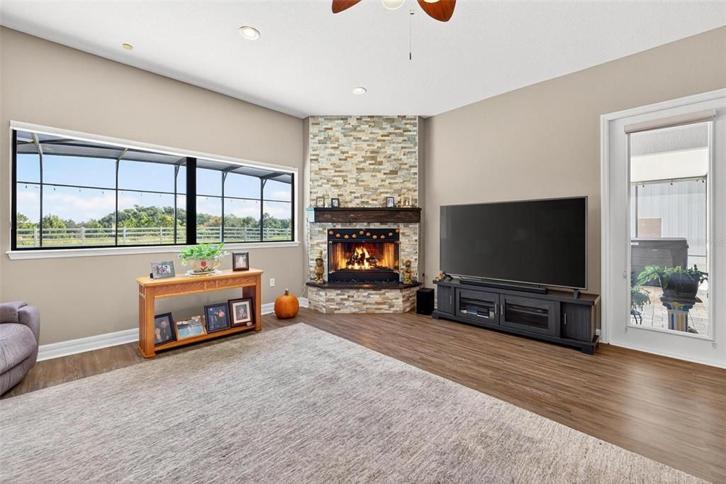 Fireplace, Interior, Recessed Lighting, Stone Walls, Wood Texture Flooring