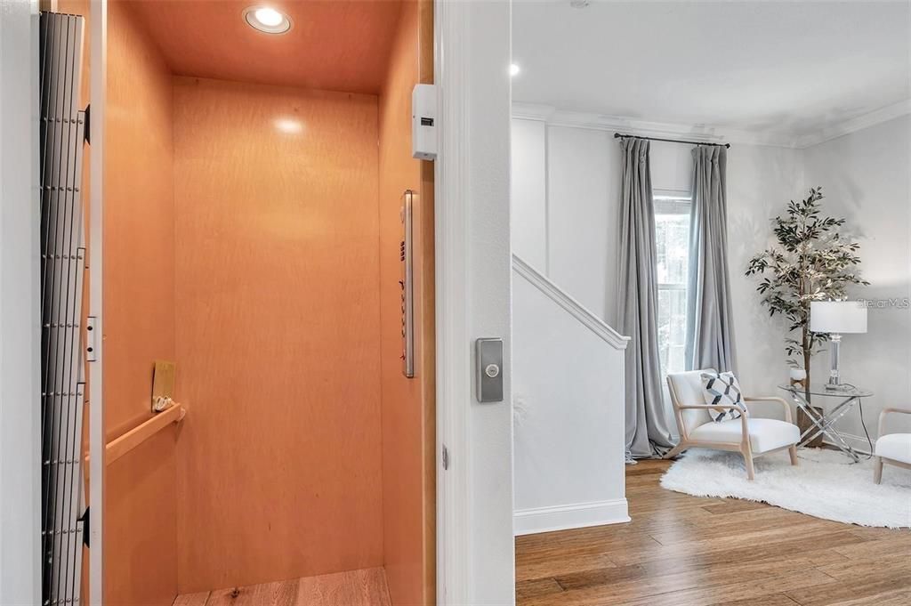 Elevator, Interior, Recessed Lighting, Wood Texture Flooring, Wooden Walls