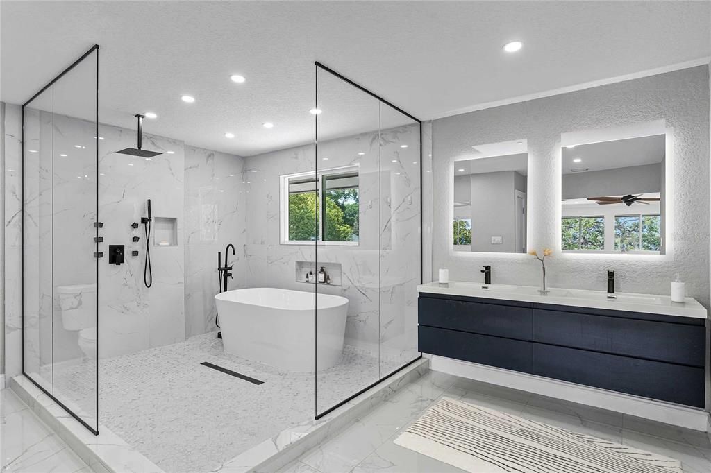 Bathroom, Dual Sink Vanities, Free Standing Baths, Glass Shower, Interior, Marble, Marble Walls, Recessed Lighting