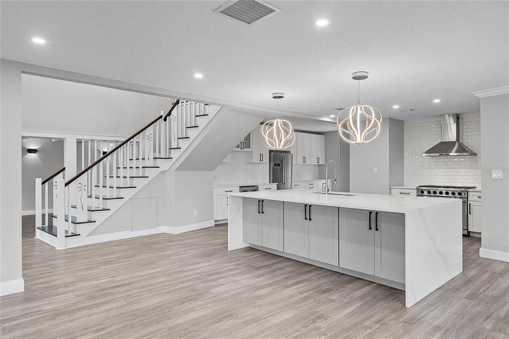 Interior, Kitchen, Pendant Lights, Recessed Lighting, Stainless Steel Appliances, Wood Texture Flooring