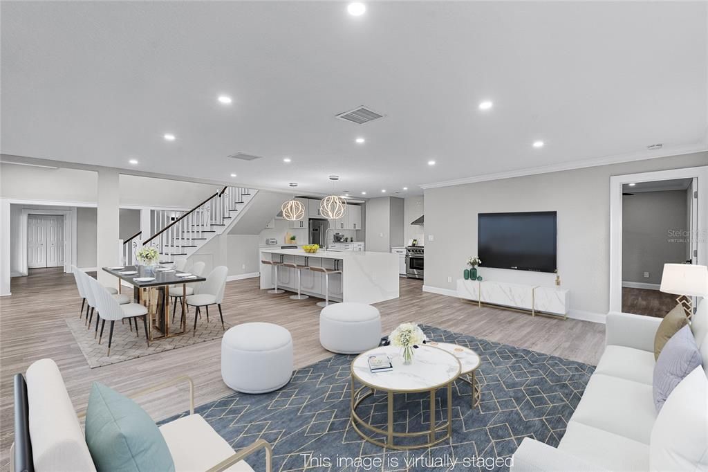 Dining room, Interior, Kitchen, Living room, Recessed Lighting, Stainless Steel Appliances, Wood Texture Flooring