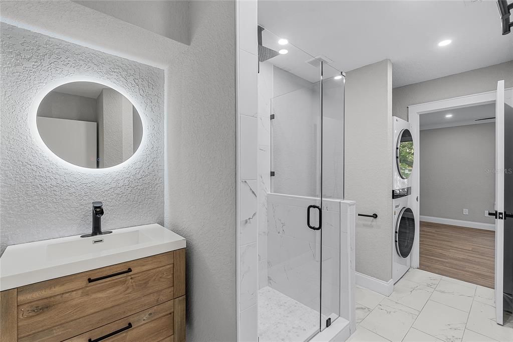 Bathroom, Glass Shower, Interior, Marble, Marble Walls, Recessed Lighting, Wood Texture Flooring