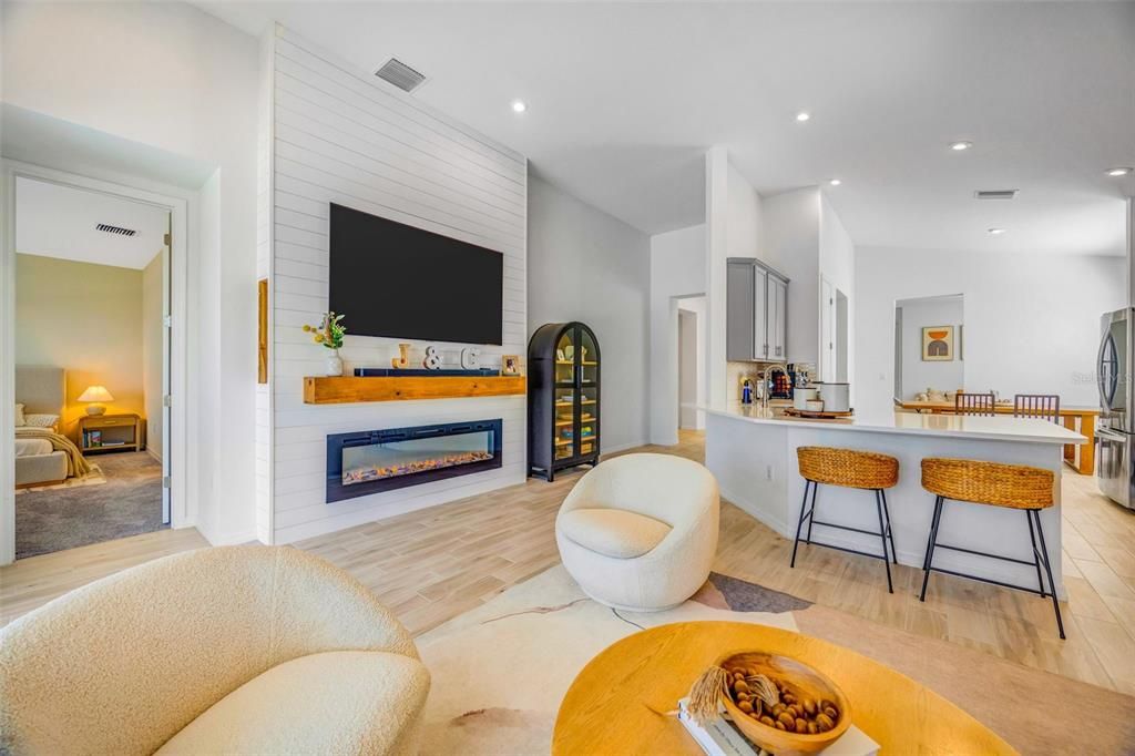 Fireplace, Interior, Living room, Recessed Lighting, Wood Texture Flooring