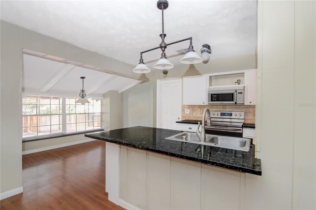 Interior, Kitchen, Pendant Lights, Stainless Steel Appliances, Wood Texture Flooring