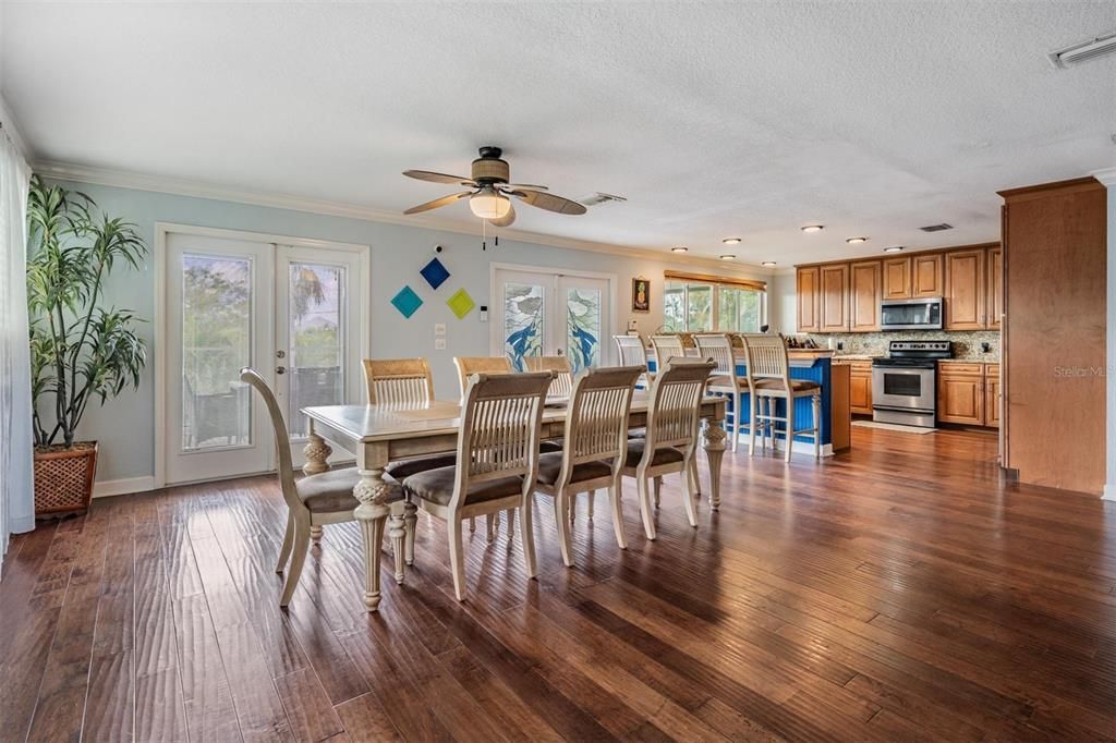 Dining room, Interior, Kitchen, Recessed Lighting, Stainless Steel Appliances, Wood Texture Flooring