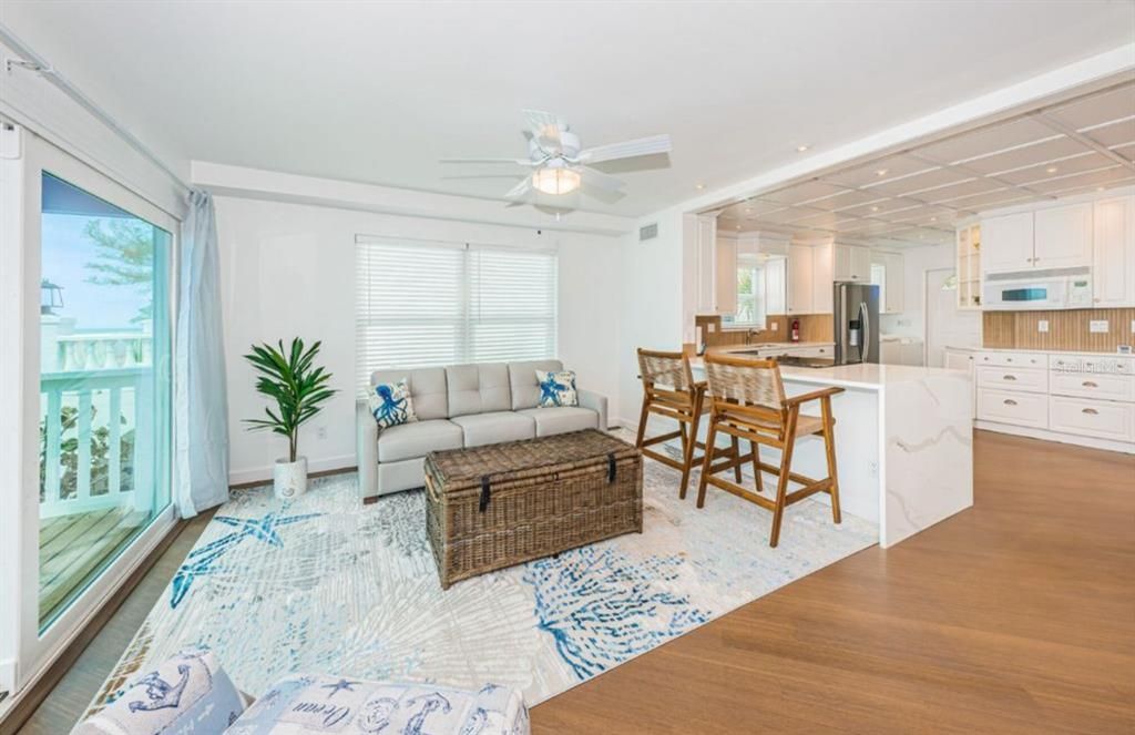 Dining room, Interior, Kitchen, Living room, Recessed Lighting, Stainless Steel Appliances, Wood Texture Flooring
