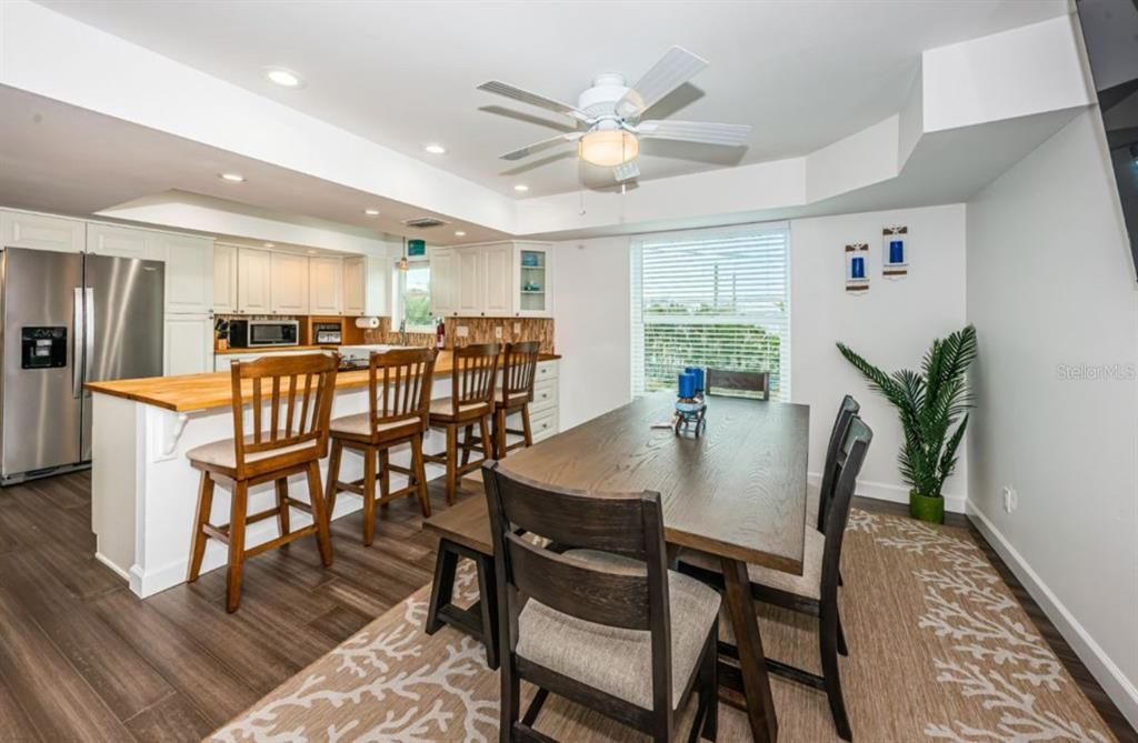 Dining room, Interior, Kitchen, Recessed Lighting, Stainless Steel Appliances, Wood Texture Flooring