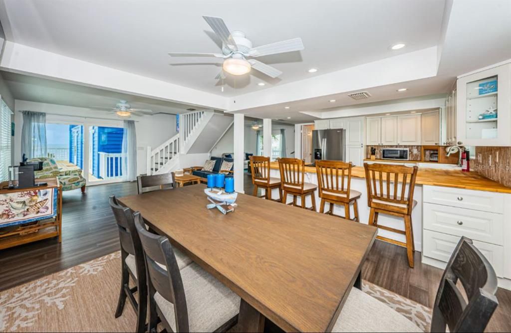 Dining room, Interior, Kitchen, Recessed Lighting, Stainless Steel Appliances, Wood Texture Flooring