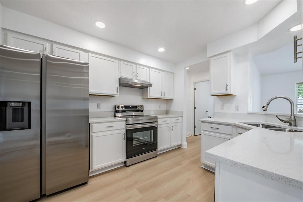 Interior, Kitchen, Recessed Lighting, Stainless Steel Appliances, Wood Texture Flooring