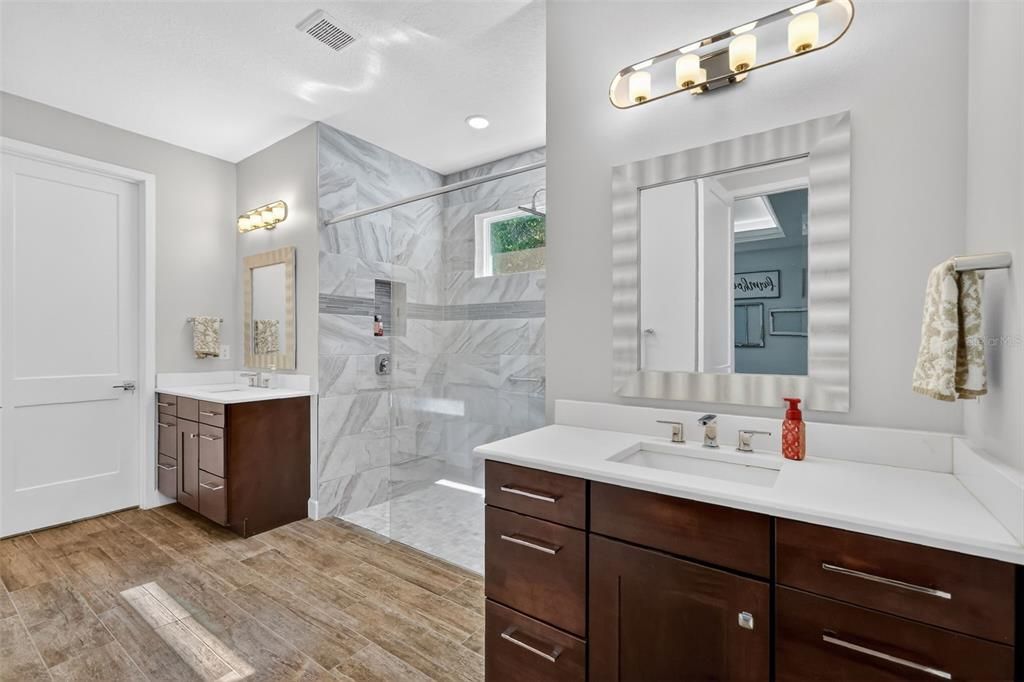 Bathroom, Glass Shower, Interior, Marble Walls, Recessed Lighting, Wood Texture Flooring