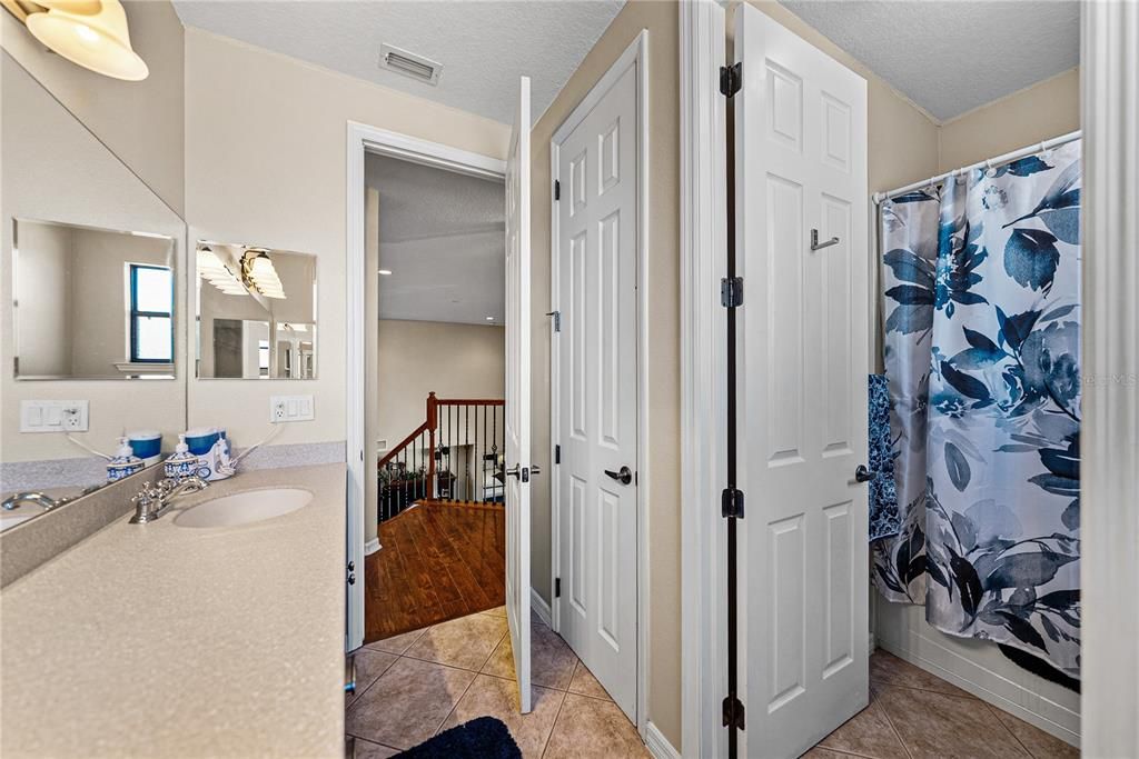 Bathroom, Dual Sink Vanities, Interior, Recessed Lighting, Wood Texture Flooring
