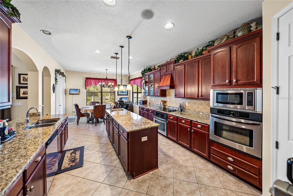Chandelier, Dining room, Interior, Kitchen, Pendant Lights, Recessed Lighting, Stainless Steel Appliances
