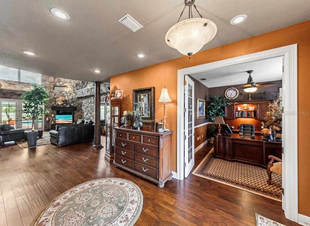 Fireplace, Interior, Living room, Pendant Lights, Recessed Lighting, Stone Walls, Wood Texture Flooring