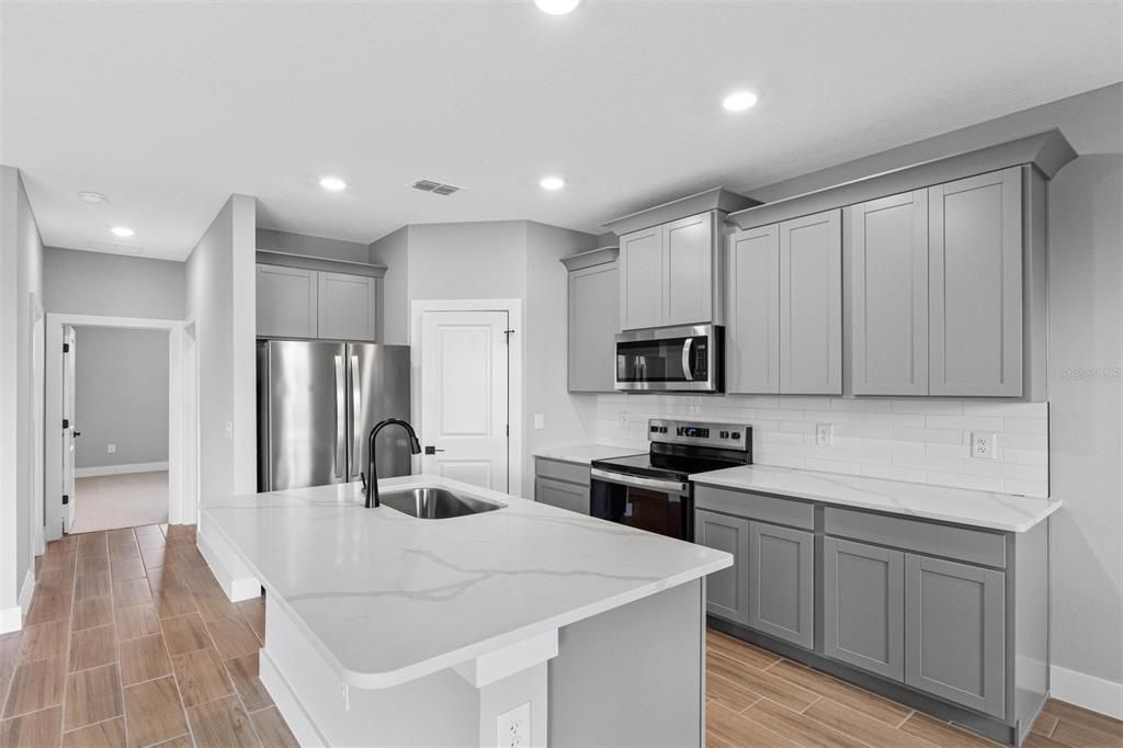 Interior, Kitchen, Recessed Lighting, Stainless Steel Appliances, Wood Texture Flooring