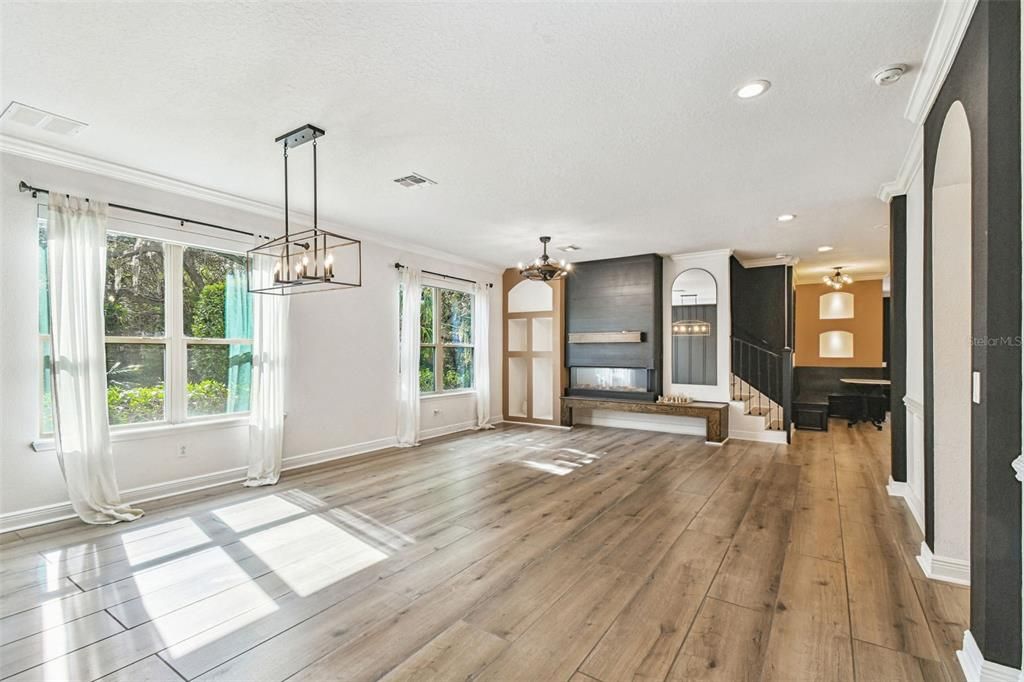 Fireplace, Interior, Pendant Lights, Recessed Lighting, Wood Texture Flooring