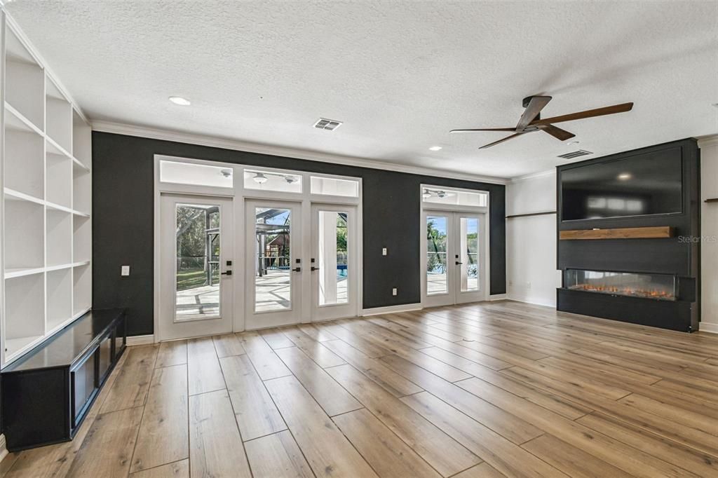 Empty room, Fireplace, Interior, Recessed Lighting, Wood Texture Flooring