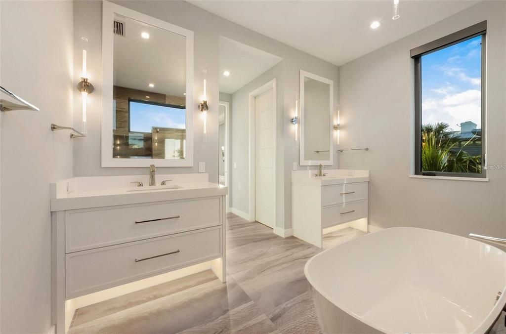Bathroom, Dual Sink Vanities, Free Standing Baths, Interior, Recessed Lighting, Wood Texture Flooring
