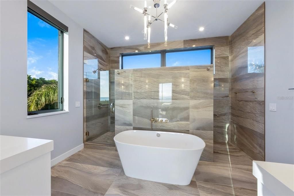 Bathroom, Free Standing Baths, Glass Shower, Interior, Pendant Lights, Recessed Lighting, Wood Texture Flooring