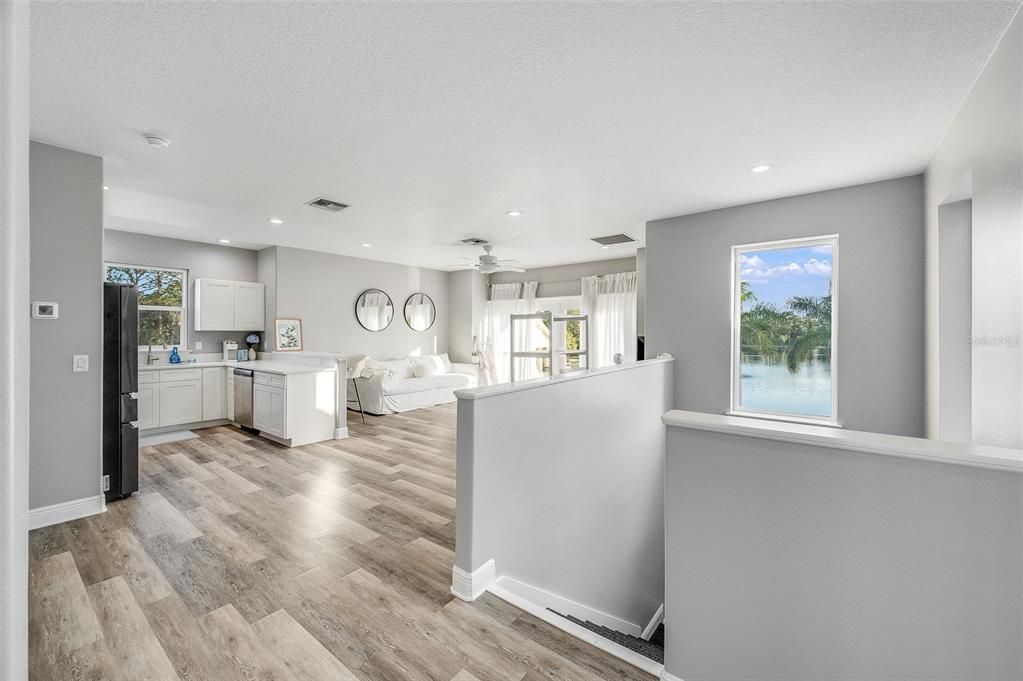 Interior, Kitchen, Recessed Lighting, Washer, Water, Wood Texture Flooring