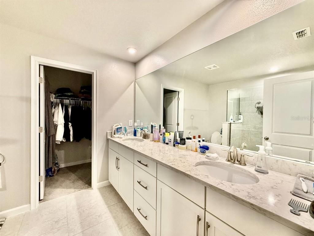 Bathroom, Dual Sink Vanities, Interior, Recessed Lighting, Walk-in Closets