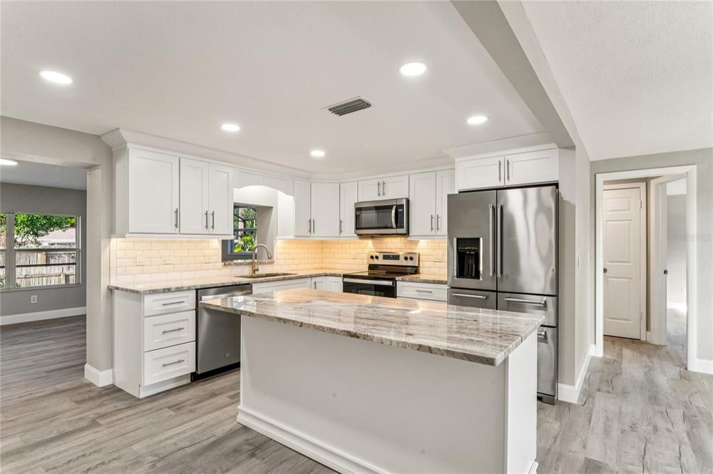 Interior, Kitchen, Recessed Lighting, Stainless Steel Appliances, Wood Texture Flooring