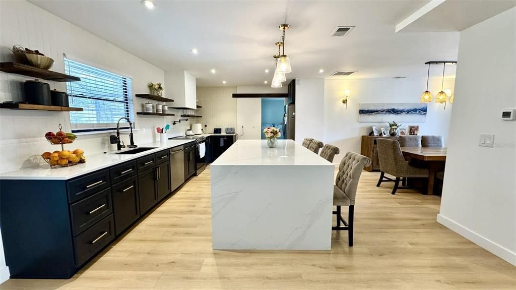 Dining room, Interior, Kitchen, Pendant Lights, Recessed Lighting, Stainless Steel Appliances, Wood Texture Flooring
