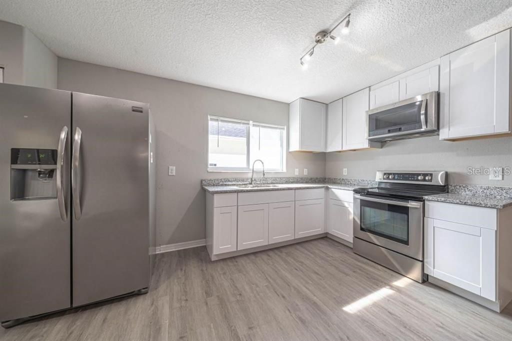 Interior, Kitchen, Stainless Steel Appliances, Wood Texture Flooring