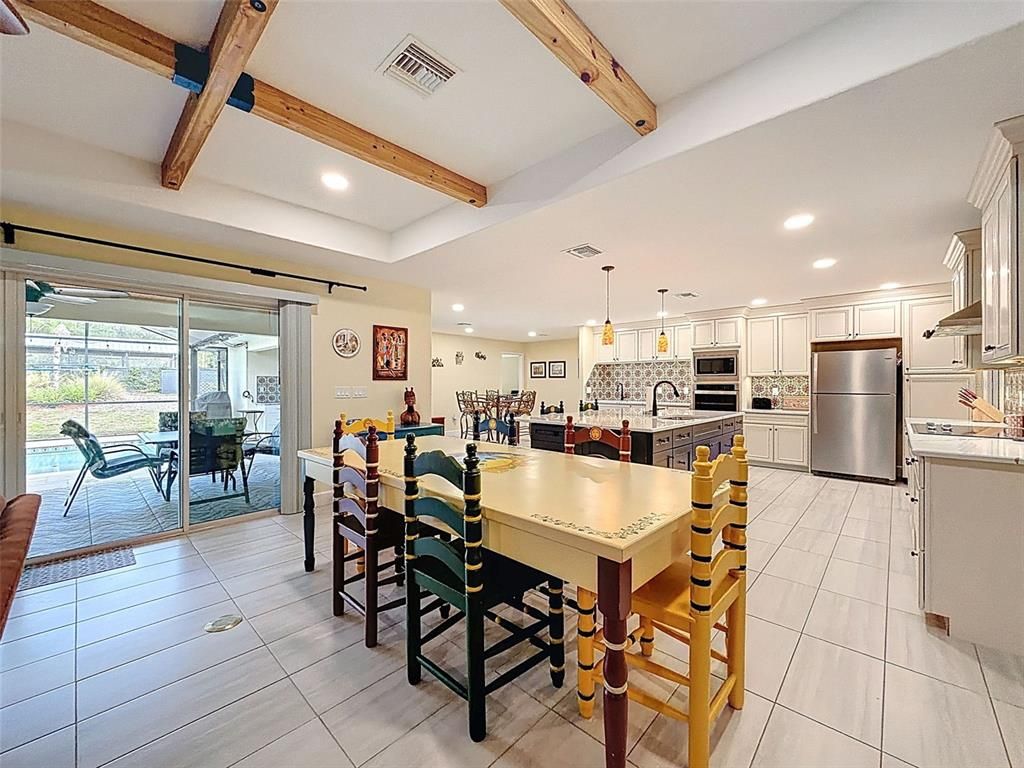 Dining room, Interior, Kitchen, Pendant Lights, Recessed Lighting, Stainless Steel Appliances, Wooden Beams