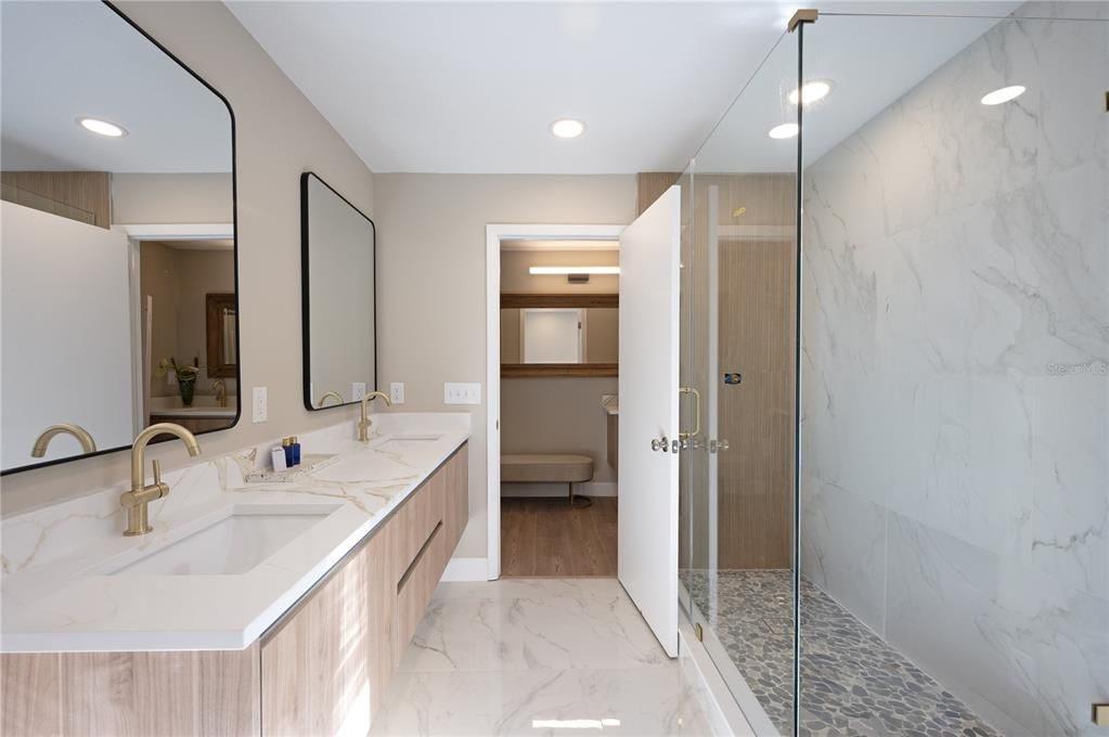 Bathroom, Dual Sink Vanities, Glass Shower, Interior, Marble, Marble Walls, Recessed Lighting