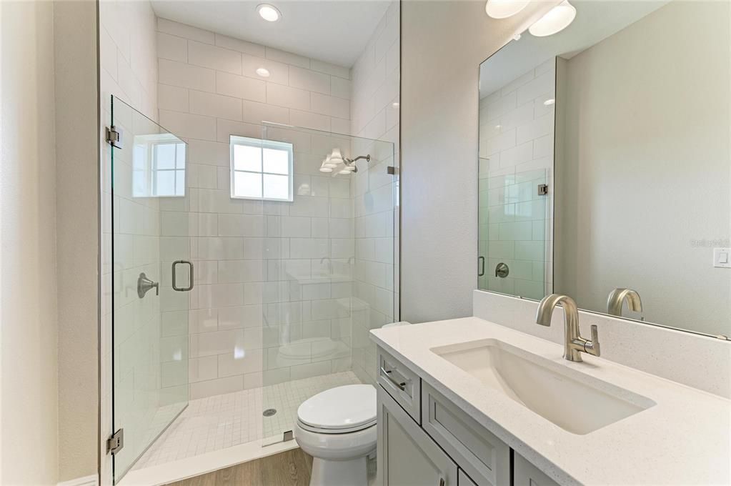 Bathroom, Glass Shower, Interior, Recessed Lighting, Wood Texture Flooring