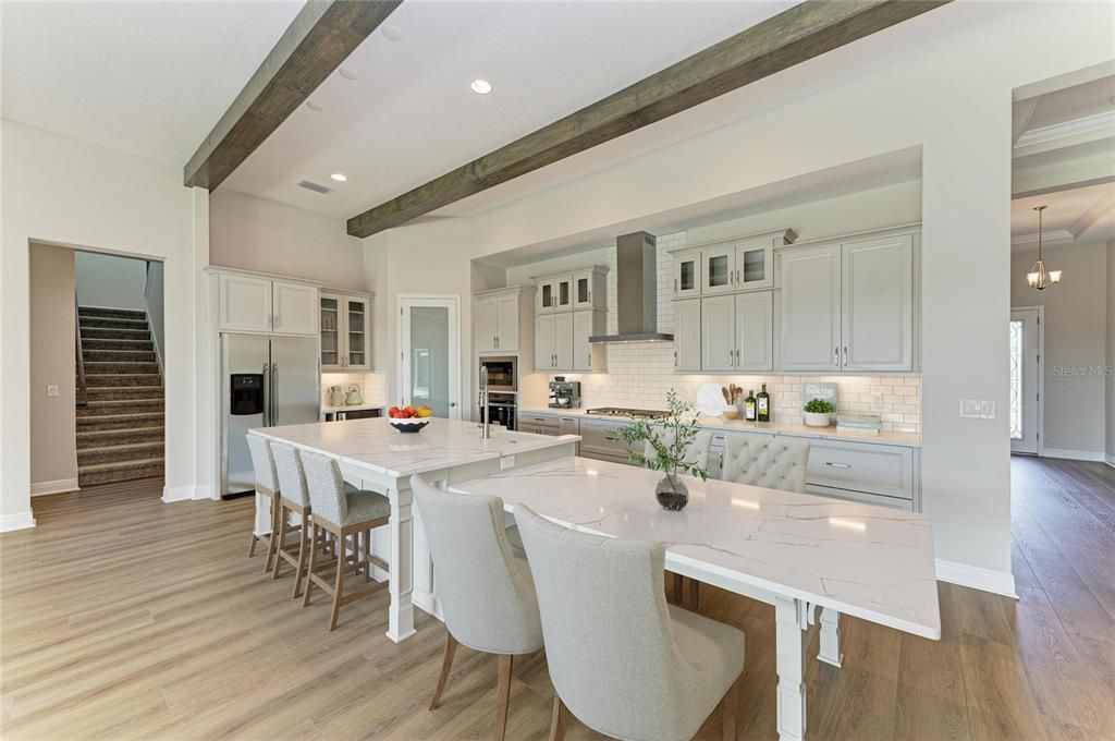 Dining room, Interior, Kitchen, Pendant Lights, Recessed Lighting, Stainless Steel Appliances, Wooden Beams, Wood Texture Flooring