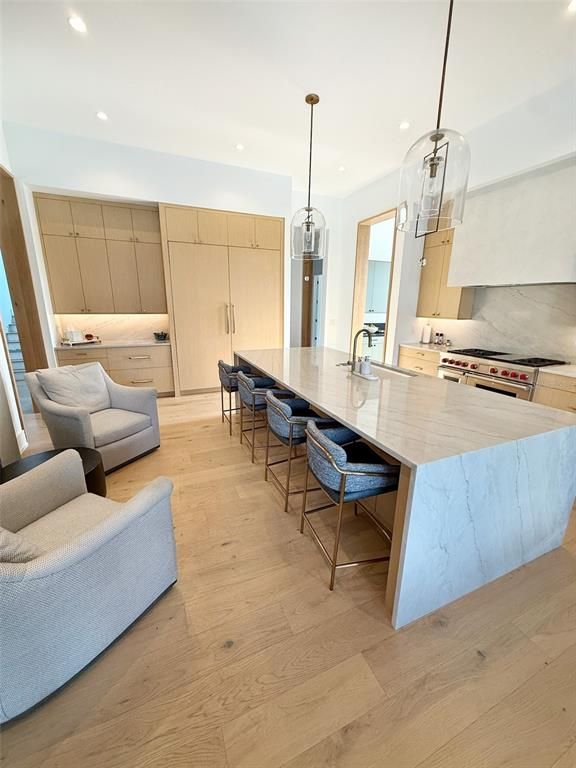 Interior, Kitchen, Marble Walls, Pendant Lights, Recessed Lighting, Wood Texture Flooring