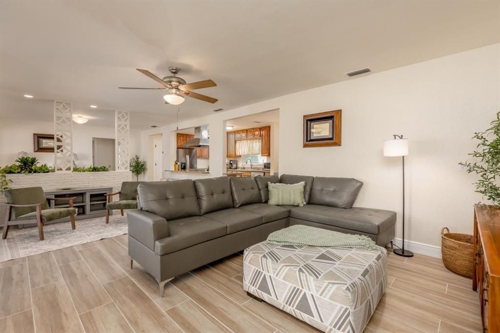 Dining room, Interior, Kitchen, Living room, Recessed Lighting, Stainless Steel Appliances, Wood Texture Flooring