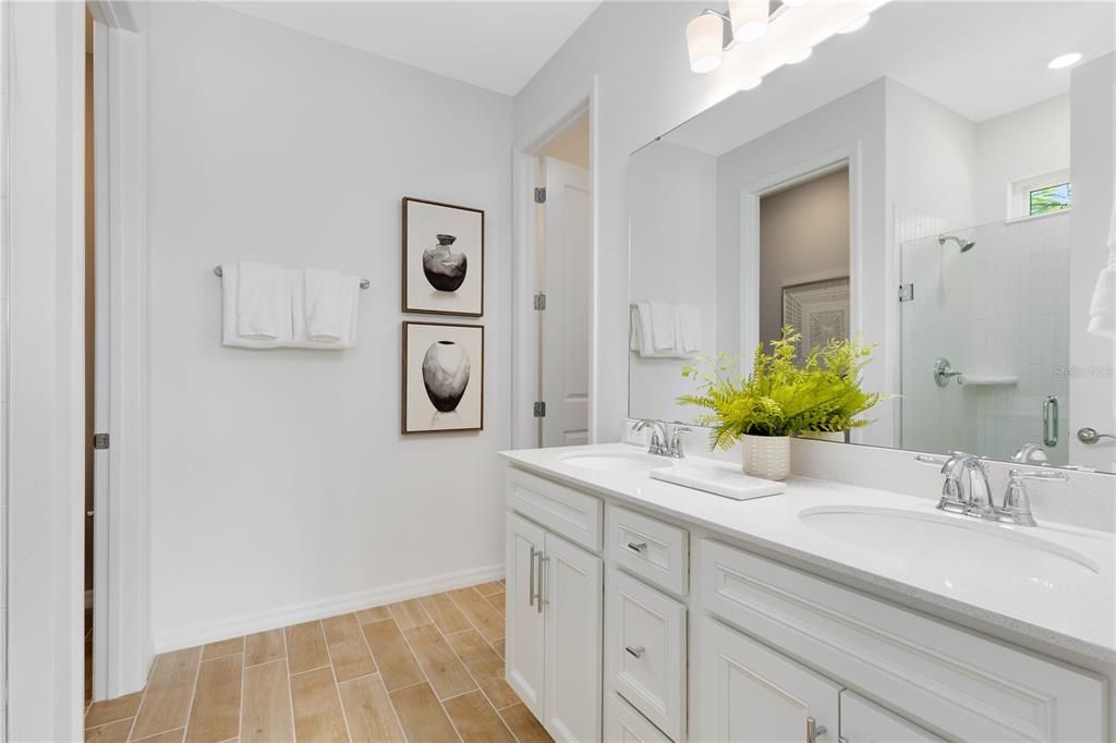 Bathroom, Dual Sink Vanities, Interior, Recessed Lighting, Wood Texture Flooring