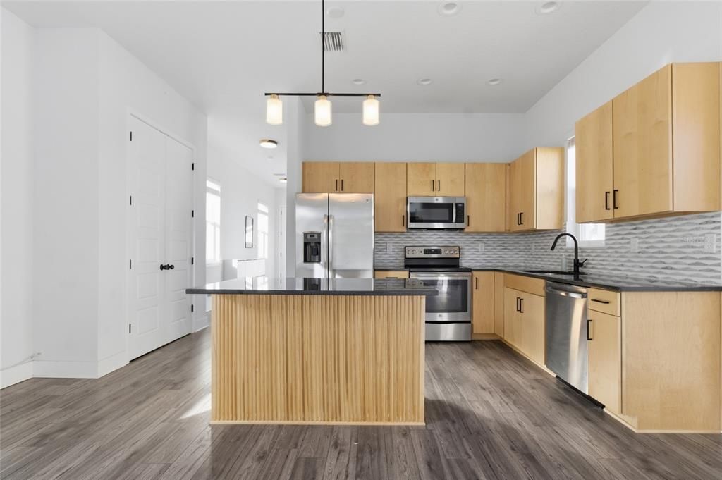 Interior, Kitchen, Pendant Lights, Recessed Lighting, Stainless Steel Appliances, Wood Texture Flooring