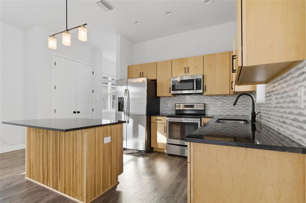 Interior, Kitchen, Pendant Lights, Recessed Lighting, Stainless Steel Appliances, Wood Texture Flooring