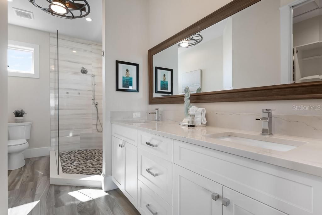 Bathroom, Dual Sink Vanities, Glass Shower, Interior, Recessed Lighting, Wood Texture Flooring