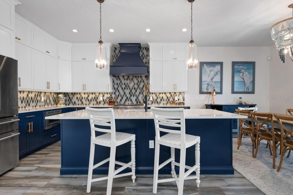 Chandelier, Interior, Kitchen, Pendant Lights, Recessed Lighting, Stainless Steel Appliances, Wood Texture Flooring