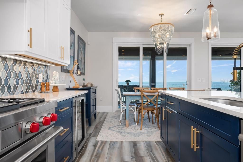 Dining room, Interior, Kitchen, Pendant Lights, Stainless Steel Appliances, Water, Wood Texture Flooring