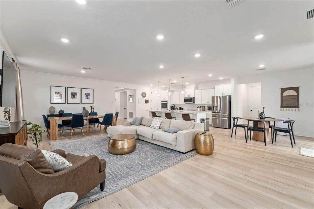 Dining room, Interior, Kitchen, Living room, Pendant Lights, Recessed Lighting, Stainless Steel Appliances, Wood Texture Flooring