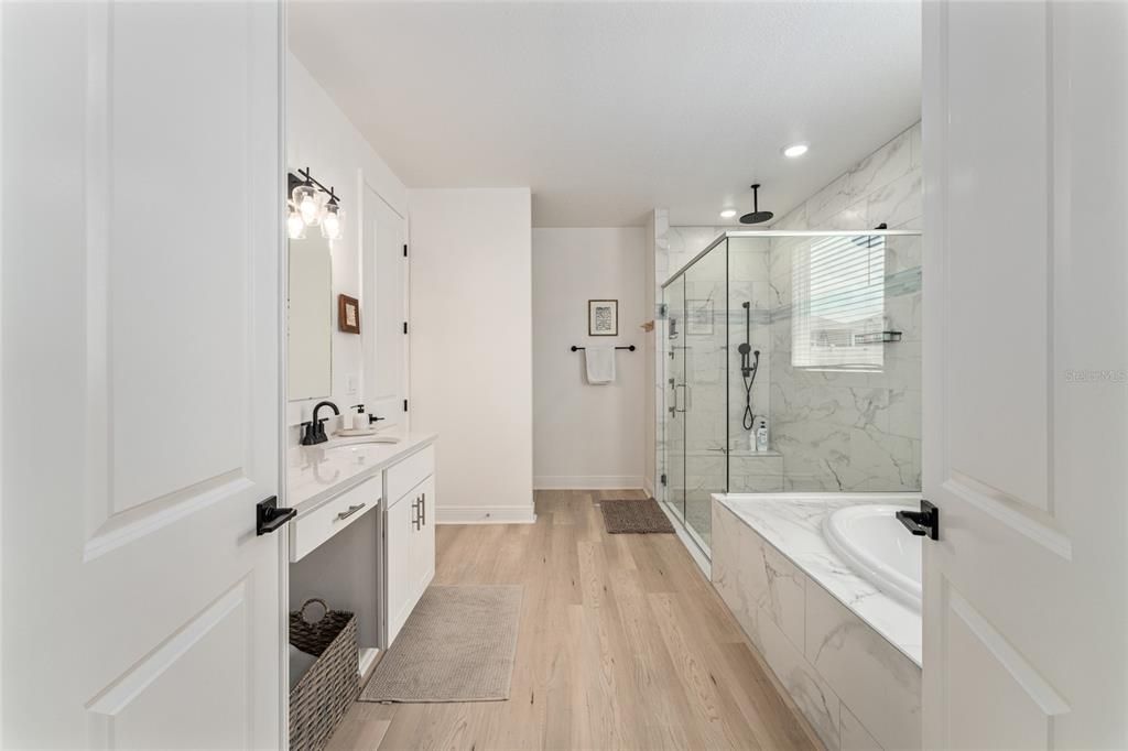 Bathroom, Glass Shower, Interior, Marble Walls, Recessed Lighting, Wood Texture Flooring