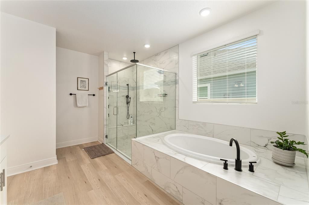 Bathroom, Glass Shower, Interior, Marble Walls, Recessed Lighting, Wood Texture Flooring