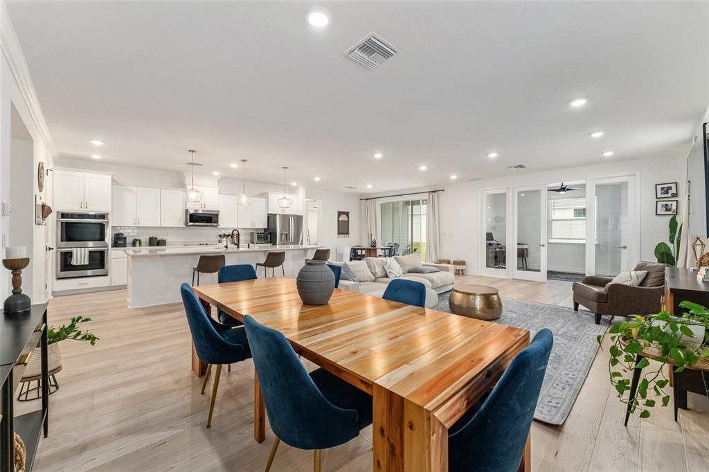 Dining room, Interior, Kitchen, Living room, Pendant Lights, Recessed Lighting, Stainless Steel Appliances, Wood Texture Flooring