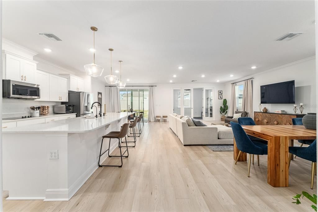 Dining room, Interior, Kitchen, Living room, Pendant Lights, Recessed Lighting, Stainless Steel Appliances, Wood Texture Flooring