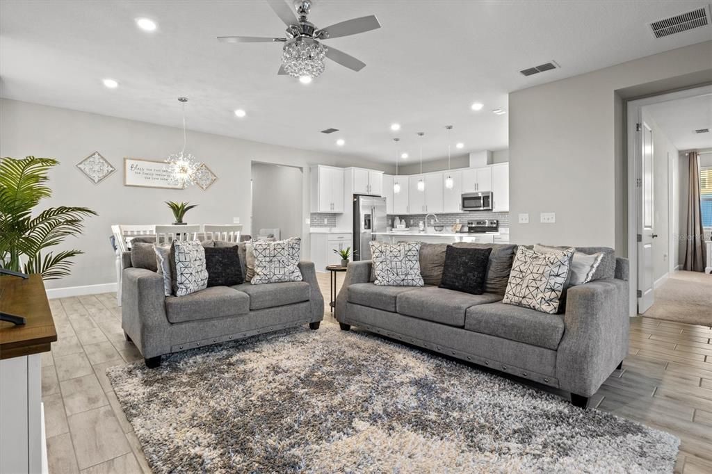 Dining room, Interior, Kitchen, Living room, Pendant Lights, Recessed Lighting, Stainless Steel Appliances, Wood Texture Flooring