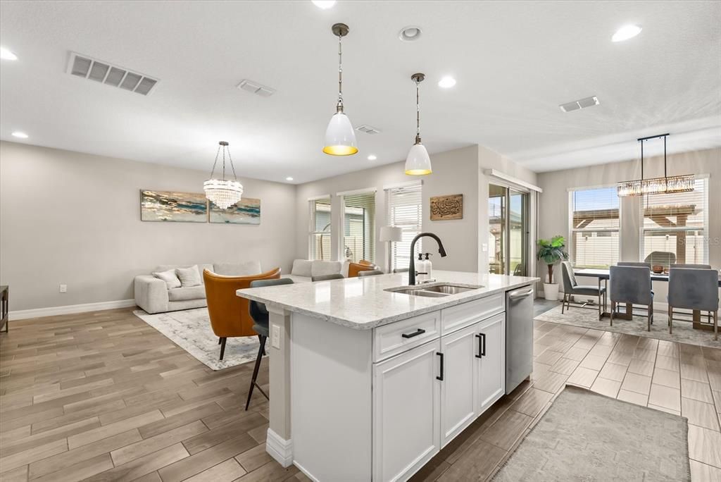 Chandelier, Dining room, Interior, Kitchen, Living room, Pendant Lights, Recessed Lighting, Wood Texture Flooring