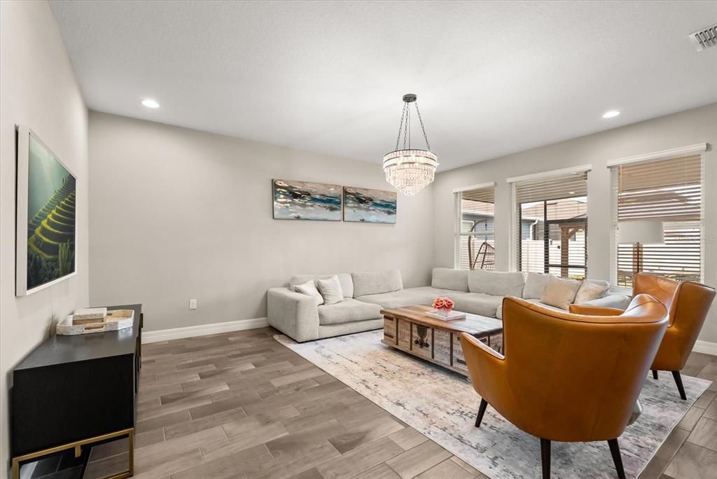 Chandelier, Interior, Living room, Recessed Lighting, Wood Texture Flooring